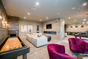 Social lounge with catering kitchen fireplace gaming and tv’s